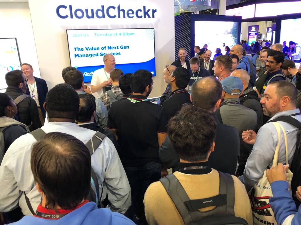 CloudCheckr at re:Invent 2019 giving a talk at our booth